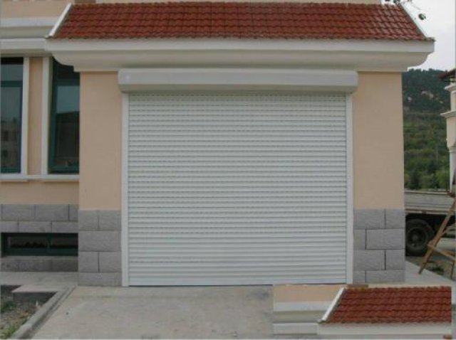 太原定做手动卷闸门电动欧式保温门抗风快速卷帘门