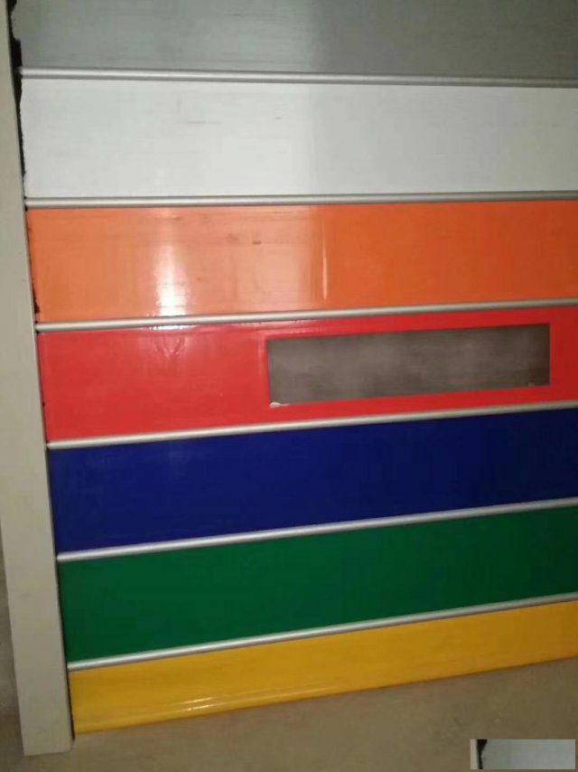 无锡惠山电动水晶卷帘门防风电动卷帘门遥控器报警器