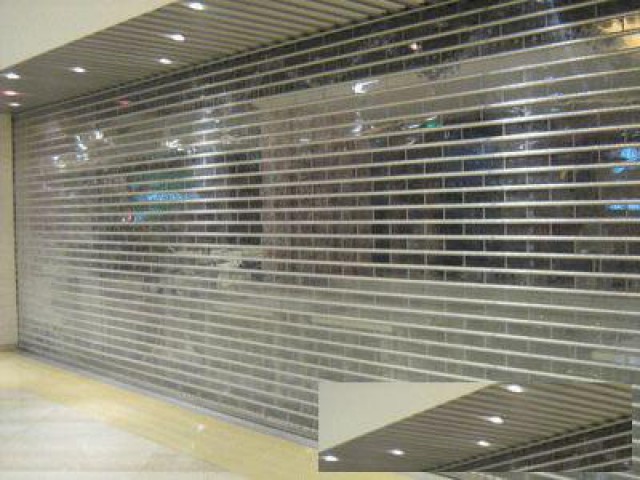 天津水晶卷帘门厂家，天津电动水晶卷帘门定做安装，佳美门业