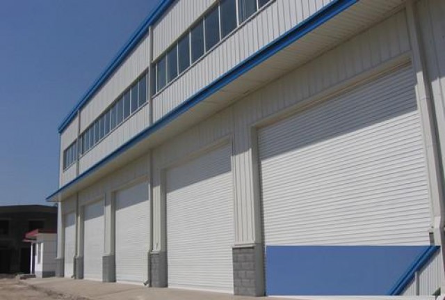 北京修铝合金卷帘门换车库门电机