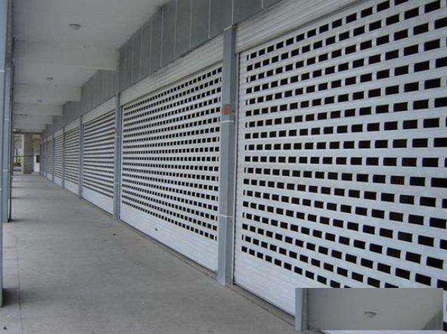 闵行区铝型材卷帘门透明水晶门网型门定做安装