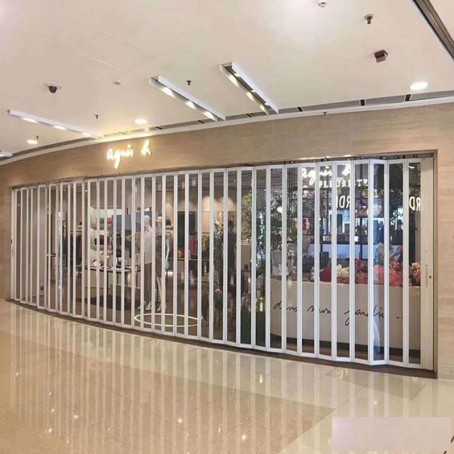 杨浦区定做电动抗风门电动水晶门铝合金电动门制作安装