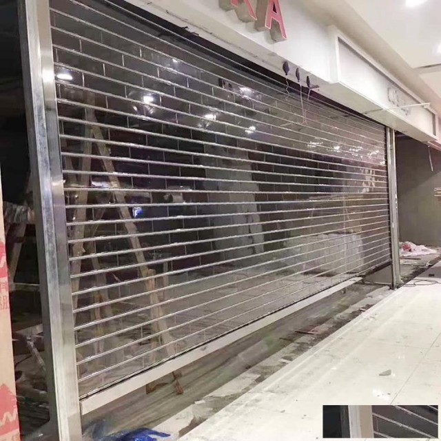 宝山区折叠门直条水晶门电动抗风门制作安装