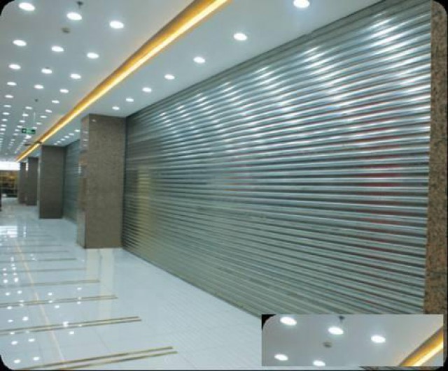 天津鑫旺门业专业卷帘门维修安装