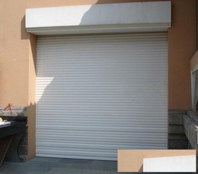 天津东丽区鑫旺门业卷帘门维修快速门安装